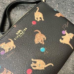 Coach wristlet with cat print. Brand new